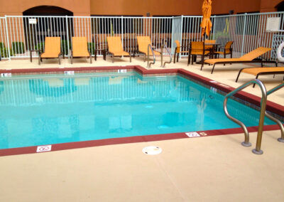 san antonio commercial pool deck resurfacing with textured concrete overlay knockdown